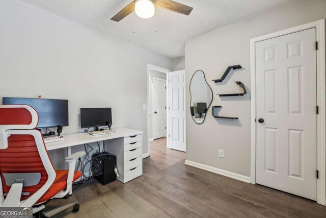 2657 Albion Farm Way, Duluth, GA 30097 - home office with wood finished floors, a ceiling fan, and baseboards