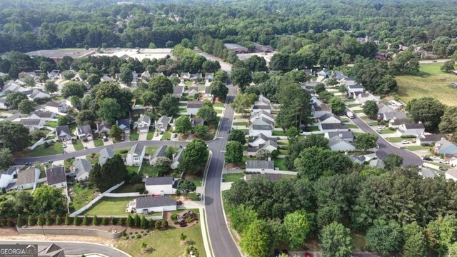 2657 Albion Farm Way, Duluth, GA 30097 - aerial view of property and surrounding area featuring a heavily wooded area and nearby suburban area