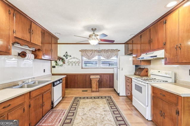 289 Hilton St, Monticello, GA 31064 - kitchen featuring white appliances, under cabinet range hood, a sink, a ceiling fan, and light wood-style flooring