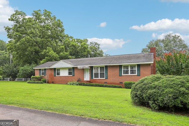 289 Hilton St, Monticello, GA 31064 - single story home with crawl space, brick siding, a shingled roof, and a chimney