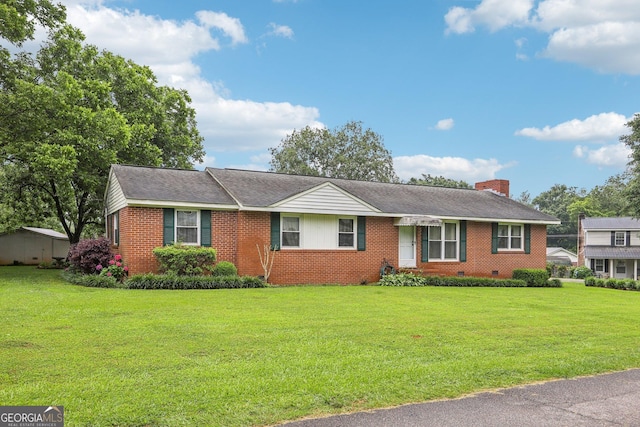 289 Hilton St, Monticello, GA 31064 - single story home with brick siding, a front lawn, a chimney, and crawl space