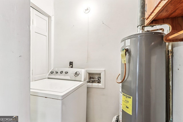 289 Hilton St, Monticello, GA 31064 - washroom with washer / clothes dryer, water heater, and cabinet space