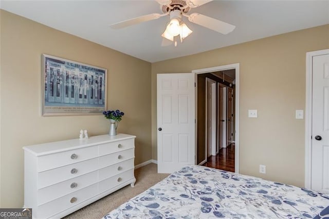 262 Sandhurst Ct, Suwanee, GA 30024 - bedroom with carpet floors and a ceiling fan