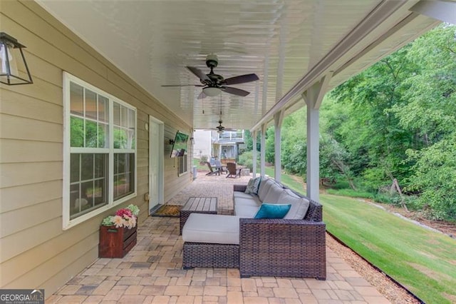 262 Sandhurst Ct, Suwanee, GA 30024 - view of patio featuring a ceiling fan and an outdoor hangout area