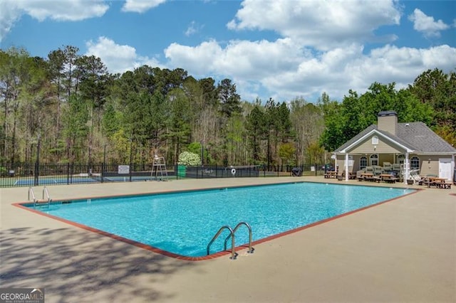 262 Sandhurst Ct, Suwanee, GA 30024 - community pool featuring a patio area