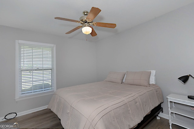 4814 Chesil Ave, Columbus, GA 31904 - bedroom with baseboards, multiple windows, wood finished floors, and a ceiling fan