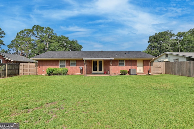 4814 Chesil Ave, Columbus, GA 31904 - back of property with french doors, brick siding, a patio area, a gate, and central AC