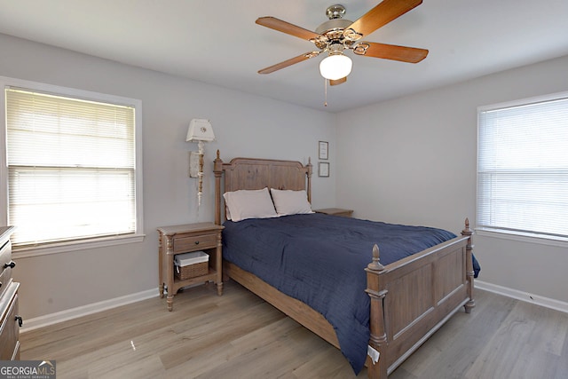 4814 Chesil Ave, Columbus, GA 31904 - bedroom with light wood finished floors, baseboards, and a ceiling fan