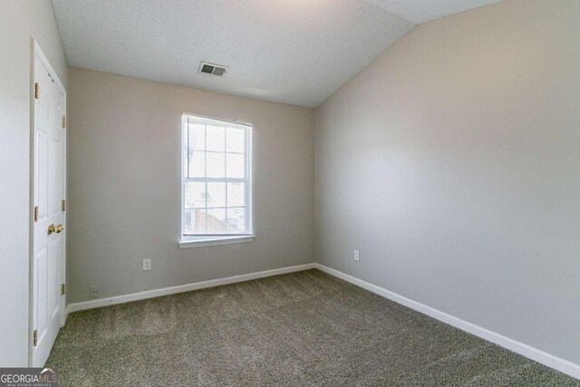 256 Turnstone Rd, Stockbridge, GA 30281 - carpeted empty room featuring baseboards and a textured ceiling