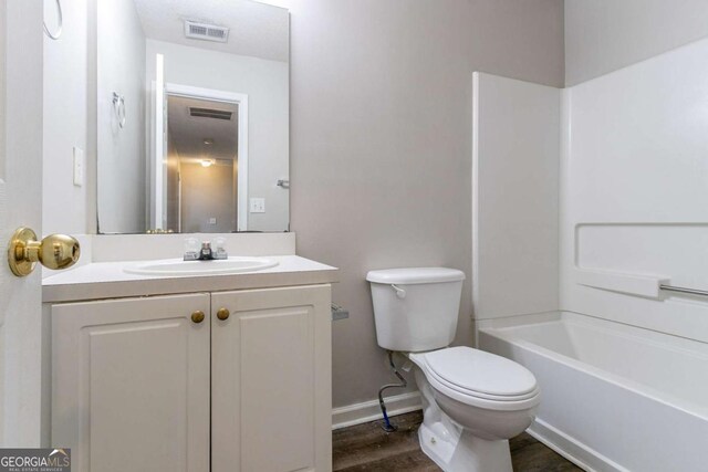 256 Turnstone Rd, Stockbridge, GA 30281 - bathroom with vanity, wood finished floors, and shower / bath combination