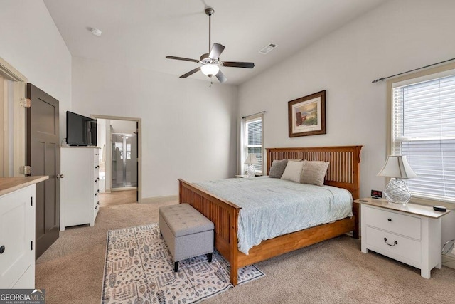 2525 Well Springs Dr, Buford, GA 30519 - bedroom featuring light carpet, multiple windows, ceiling fan, and ensuite bath