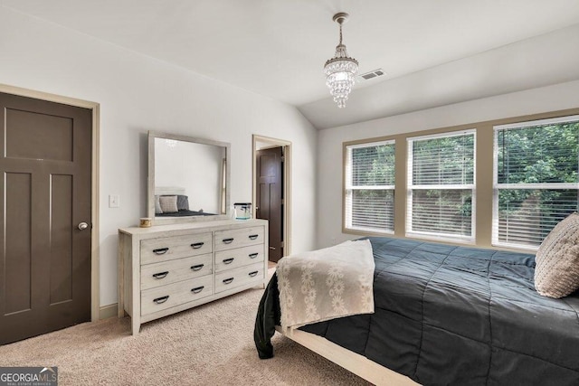 2525 Well Springs Dr, Buford, GA 30519 - bedroom with light carpet, lofted ceiling, and a chandelier