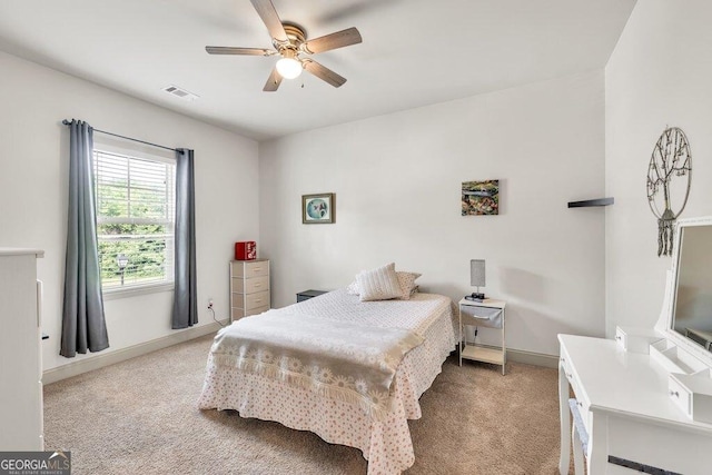 2525 Well Springs Dr, Buford, GA 30519 - bedroom with light carpet and ceiling fan