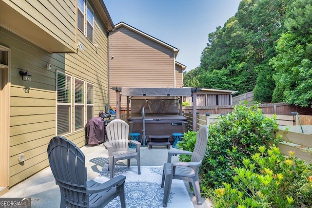 2525 Well Springs Dr, Buford, GA 30519 - view of patio / terrace featuring a hot tub