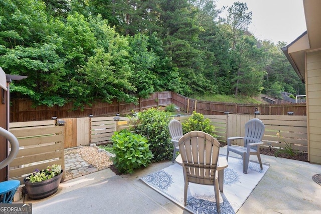 2525 Well Springs Dr, Buford, GA 30519 - fenced backyard featuring a patio