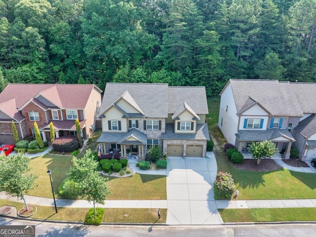 2525 Well Springs Dr, Buford, GA 30519 - aerial perspective of suburban area featuring a forest