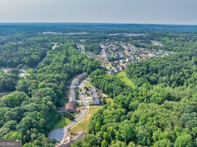 2525 Well Springs Dr, Buford, GA 30519 - aerial view of property and surrounding area with a forest and nearby suburban area