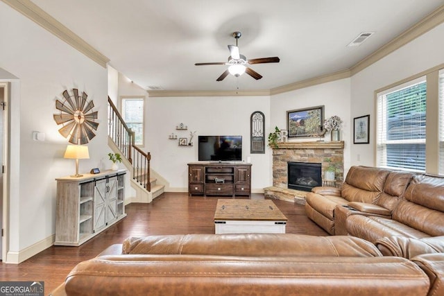 2525 Well Springs Dr, Buford, GA 30519 - living room featuring ceiling fan, stairs, plenty of natural light, ornamental molding, and dark wood finished floors