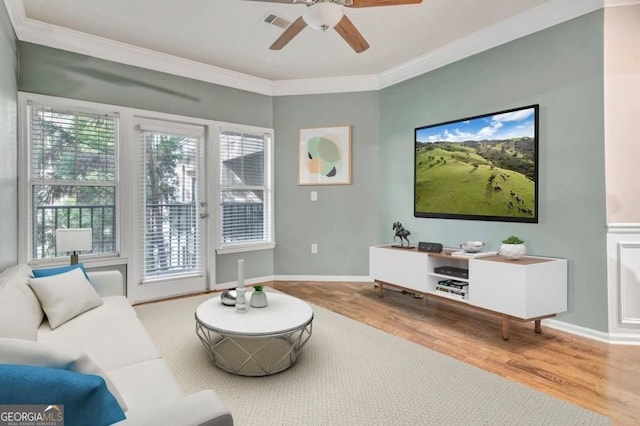 1850 Cotillion Dr Unit 3305, Dunwoody, GA 30338 - living area featuring wood finished floors, ceiling fan, ornamental molding, and baseboards
