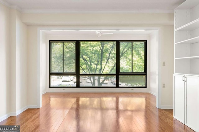 1800 Clairmont Lk Unit 216, Decatur, GA 30033 - empty room with hardwood / wood-style flooring and ornamental molding