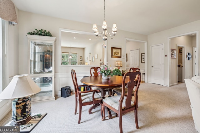 5105 Kings Common Way, Cumming, GA 30040 - dining space with light carpet and a chandelier