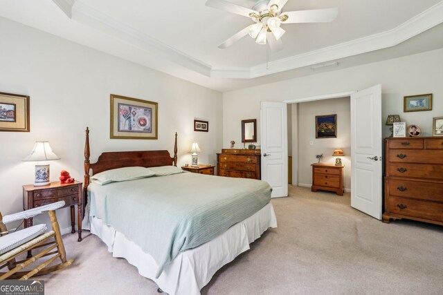 5105 Kings Common Way, Cumming, GA 30040 - bedroom featuring light carpet, a raised ceiling, ornamental molding, and a ceiling fan