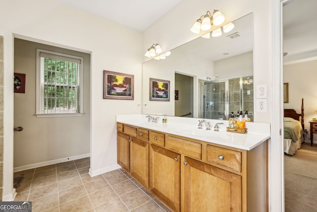 5105 Kings Common Way, Cumming, GA 30040 - full bath featuring double vanity, ensuite bathroom, a stall shower, tile patterned floors, and baseboards