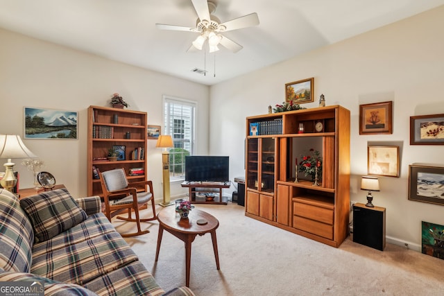 5105 Kings Common Way, Cumming, GA 30040 - carpeted living area with ceiling fan and baseboards