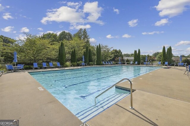 5105 Kings Common Way, Cumming, GA 30040 - community pool featuring a patio area
