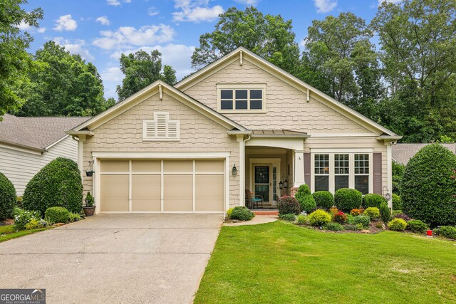 5105 Kings Common Way, Cumming, GA 30040 - craftsman-style house with concrete driveway, a front lawn, and an attached garage