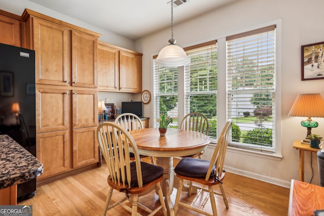 5105 Kings Common Way, Cumming, GA 30040 - dining room featuring light wood finished floors and baseboards