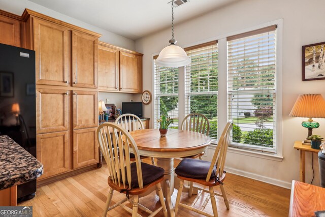 5105 Kings Common Way, Cumming, GA 30040 - dining room featuring light wood finished floors and baseboards