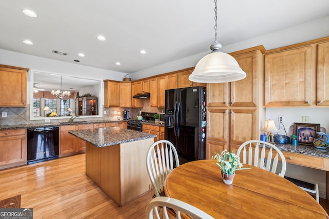 5105 Kings Common Way, Cumming, GA 30040 - kitchen with black appliances, a sink, under cabinet range hood, recessed lighting, and backsplash