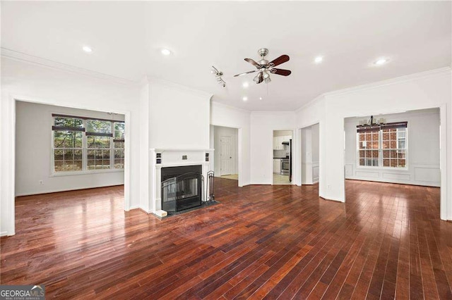 2890 Winterhaven Ct, Atlanta, GA 30360 - unfurnished living room featuring ceiling fan, a glass covered fireplace, ornamental molding, dark wood-type flooring, and recessed lighting