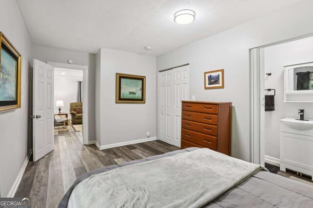 2860 Jefferson St, Austell, GA 30106 - bedroom with wood finished floors and a closet