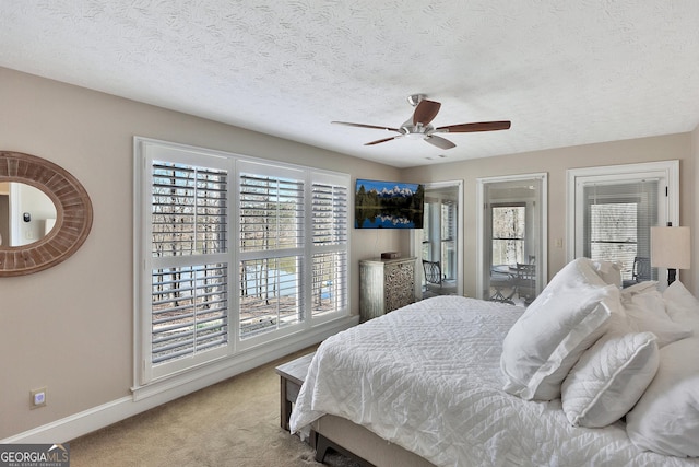 201 Hickory Hill Ln, Martin, GA 30557 - bedroom with carpet floors, baseboards, a ceiling fan, and a textured ceiling