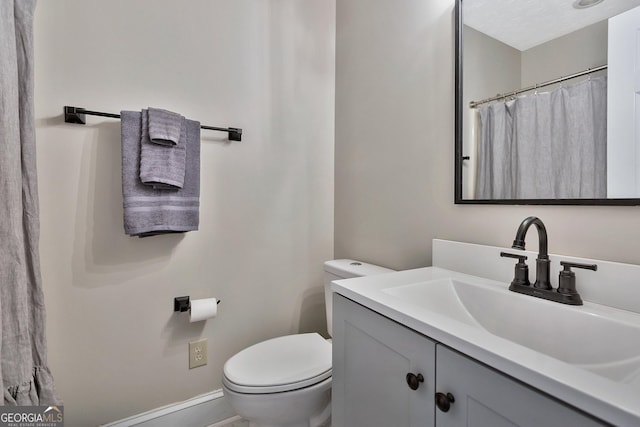 201 Hickory Hill Ln, Martin, GA 30557 - bathroom with vanity and toilet
