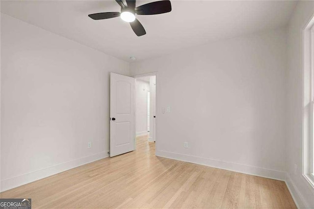 6405 Cherry Tree Ln, Atlanta, GA 30328 - unfurnished room featuring light wood-style flooring and ceiling fan