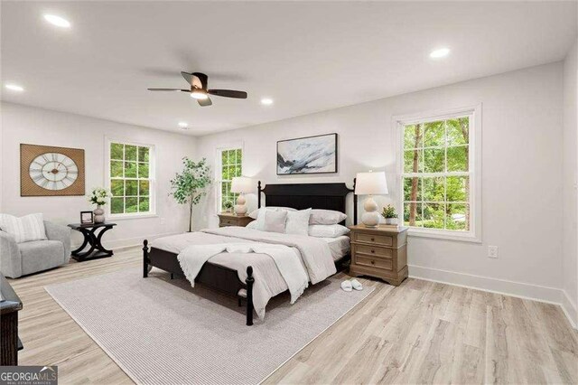 6405 Cherry Tree Ln, Atlanta, GA 30328 - bedroom with light wood-style flooring, recessed lighting, and a ceiling fan