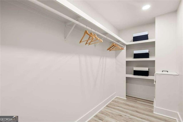 6405 Cherry Tree Ln, Atlanta, GA 30328 - spacious closet with wood finished floors