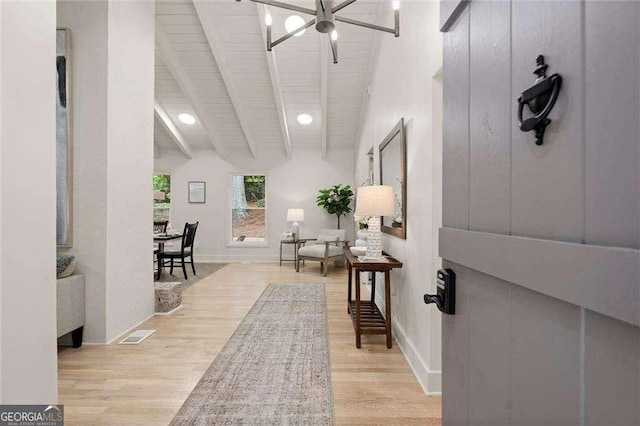 6405 Cherry Tree Ln, Atlanta, GA 30328 - hall with beam ceiling and light wood-style flooring