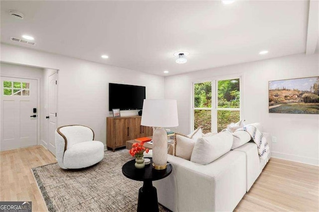 6405 Cherry Tree Ln, Atlanta, GA 30328 - living area with light wood-style flooring and recessed lighting