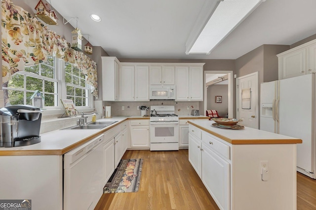 6302 Manassas Pass NW, Acworth, GA 30101 - kitchen with white appliances, light countertops, white cabinetry, and recessed lighting