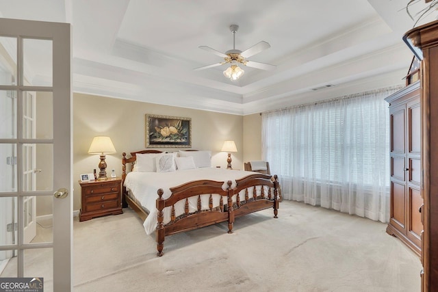 6302 Manassas Pass NW, Acworth, GA 30101 - bedroom featuring a tray ceiling, light carpet, ornamental molding, and ceiling fan