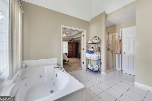 6302 Manassas Pass NW, Acworth, GA 30101 - bathroom featuring a whirlpool tub, a shower stall, ceiling fan, and tile patterned flooring