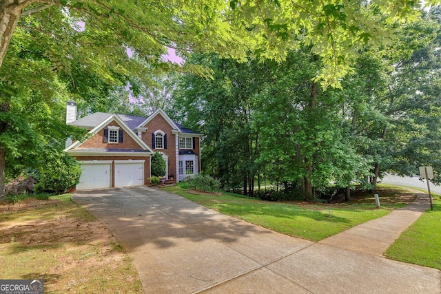 6302 Manassas Pass NW, Acworth, GA 30101 - view of front facade with brick siding, driveway, a front yard, a chimney, and a garage