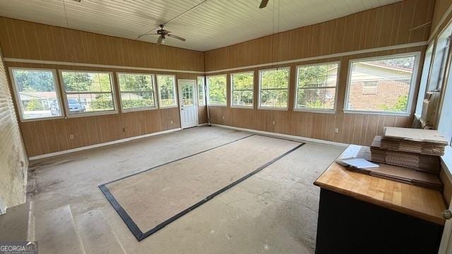 279 Baker Cir SE, Calhoun, GA 30701 - unfurnished sunroom featuring a ceiling fan and healthy amount of natural light