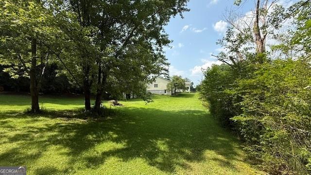 279 Baker Cir SE, Calhoun, GA 30701 - view of grassy yard