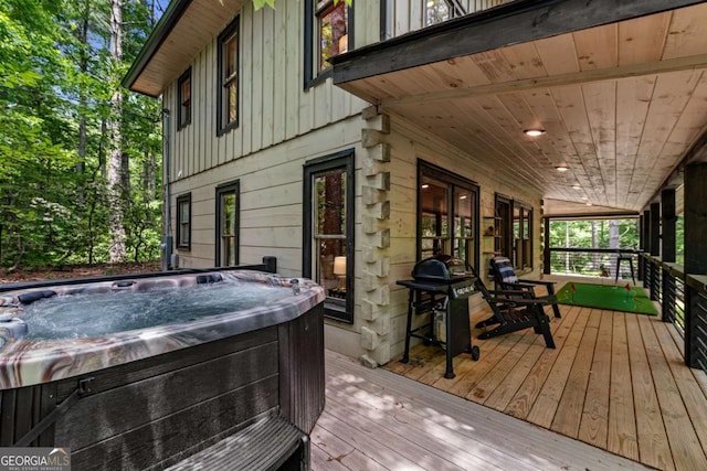 25 Hidden Ridge Ct, Cherry Log, GA 30522 - porch with a hot tub and a grill