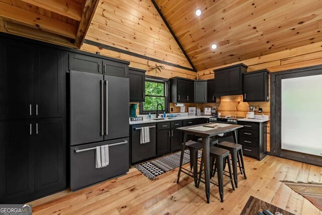 25 Hidden Ridge Ct, Cherry Log, GA 30522 - kitchen with freestanding refrigerator, dishwasher, lofted ceiling, wooden ceiling, and dark cabinets